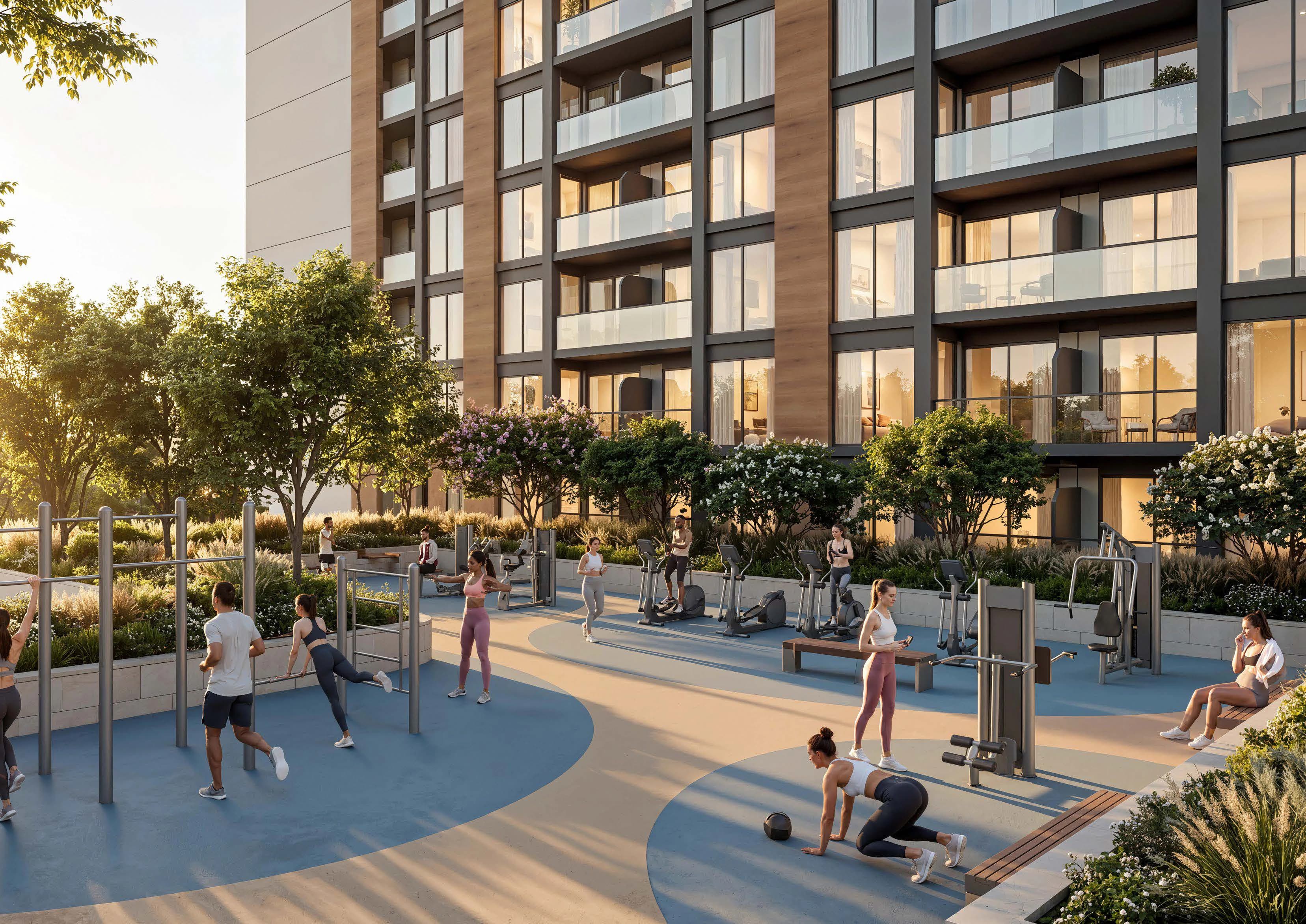 The Woods Abode — outdoor fitness area within landscaped corridors at sunset